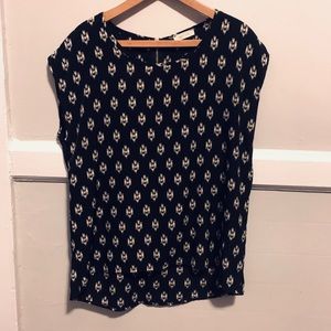 Black and cream pattern top